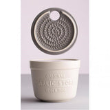 Mason Cash Garlic Store & Grater in stylish stoneware with embossed design, vented lid, and integrated grater for fresh garlic.