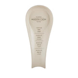 Mason Cash Spoon Rest in earthenware, features measurement guides, perfect for holding utensils and keeping counters clean.