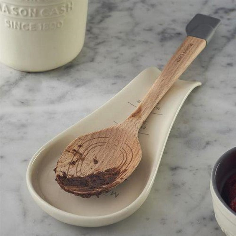 Mason Cash Spoon Rest: Stylish earthenware holder for wooden utensils, featuring measurement guides and durable, chip-resistant glaze.