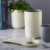 Mason Cash Spoon Rest in earthenware, neutral color, with measurement guides—perfect for keeping utensils organized and counters clean.