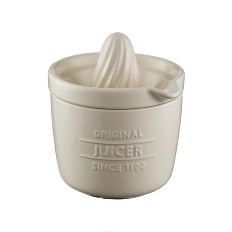 Mason Cash white earthenware juicer with spout for easy citrus juicing and storage, perfect for home chefs.