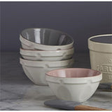 Set of 4 Mason Cash mini food prep bowls with sturdy, tilting design and textured grips for easy ingredient handling.