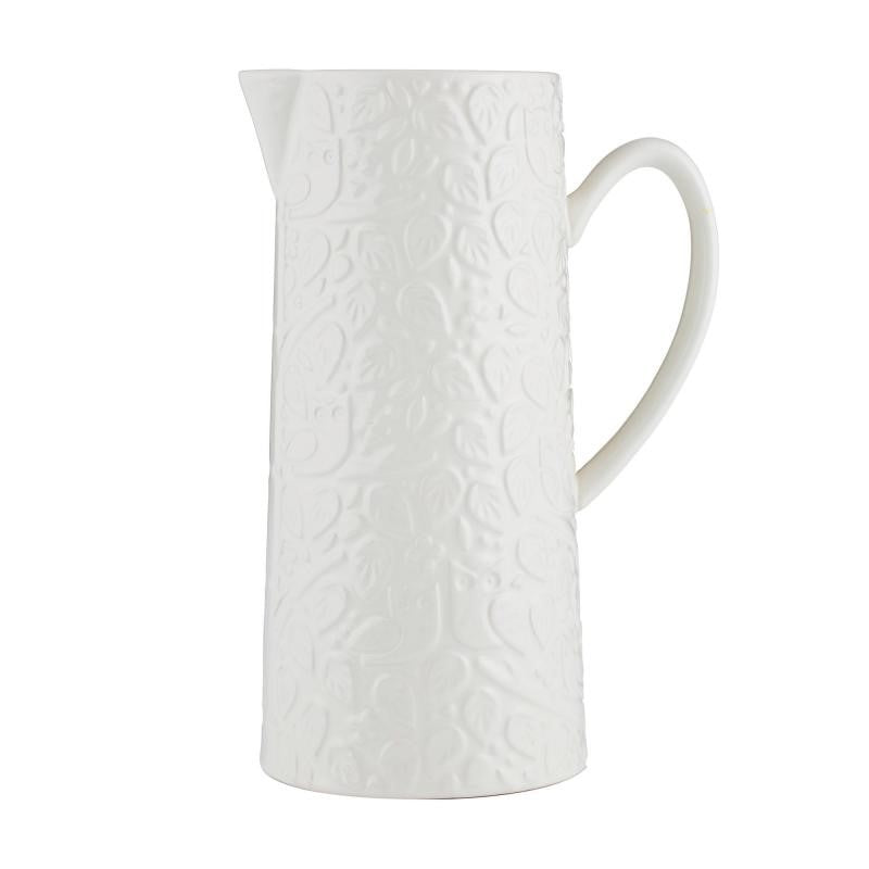 Mason Cash 1.8L jug featuring intricate forest scene embossing, perfect for stylish beverage serving.