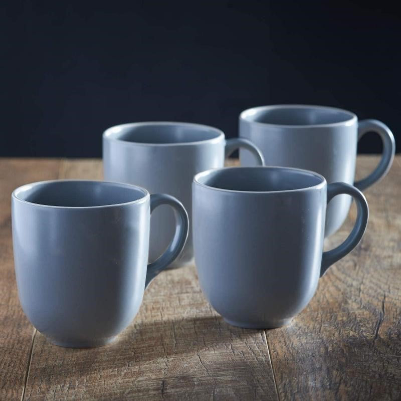 Set of 4 elegant grey stoneware mugs with embossed ripple design, perfect for hot beverages and stylish dining experiences.