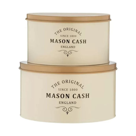 Set of two Mason Cash Heritage Cake Tins (4L & 6L) in classic design for stylish cake and cookie storage.