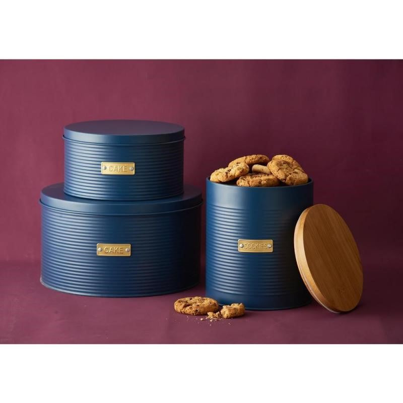 Navy 2.6L cookie storage canister with ribbed design, gold 'Cookie' badge, and bamboo lid for stylish kitchen organization.