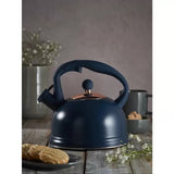 Navy stove top kettle with a gold lid, 1.8L capacity, whistling mechanism, soft-touch handle, and flip-top spout.