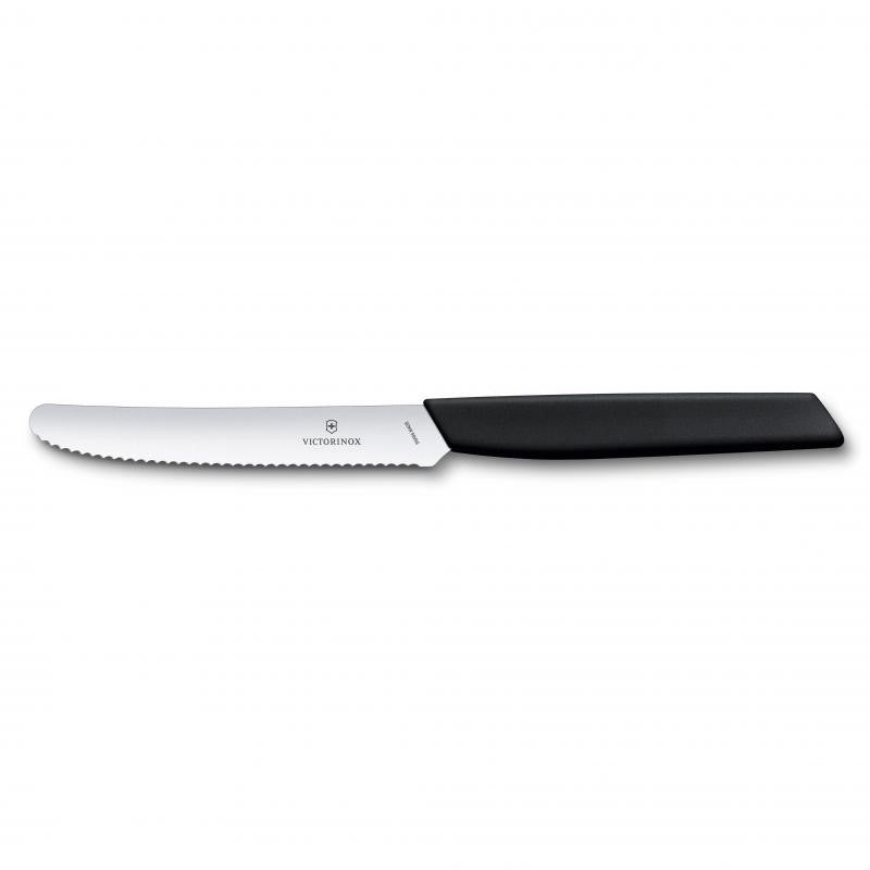 Victorinox Swiss Modern Tomato Knife with wavy edge, black ergonomic handle, perfect for slicing fruits and vegetables.