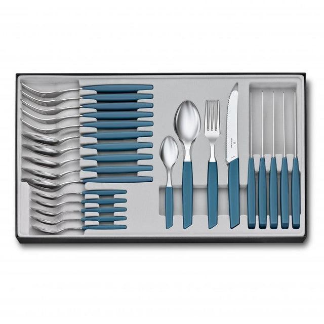 Victorinox Swiss Modern 24 Piece Table Set in cornflower, featuring ergonomic handles and ultra-sharp wavy blade edges.