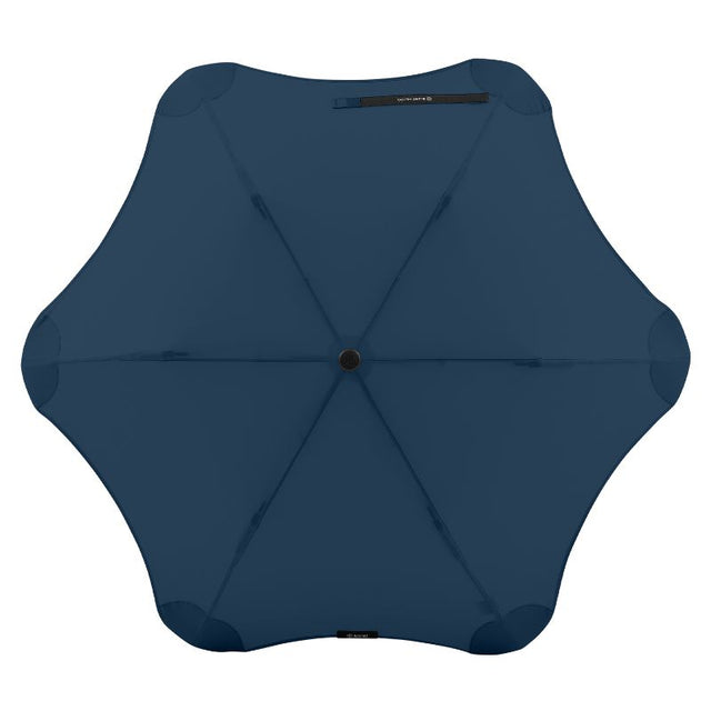 Navy BLUNT Metro umbrella with automatic open, compact design, and robust wind-resistant frame for stylish urban protection.