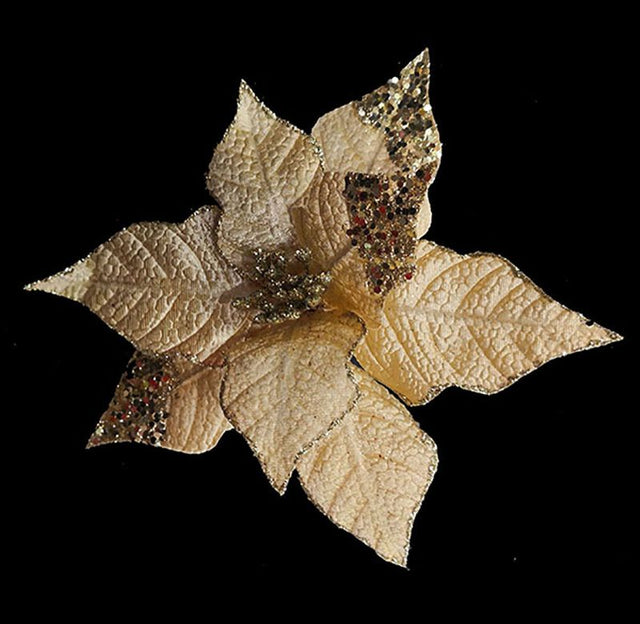 Glittering gold artificial poinsettia with sequins, perfect for elegant holiday decor and seasonal arrangements.