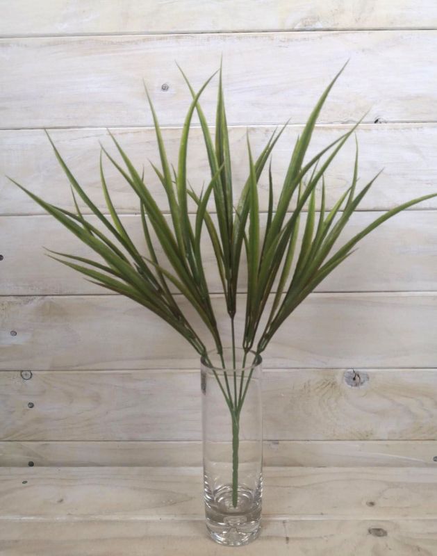 Artificial Vanilla Grass Bush in rich brown, featuring lifelike leaves for low-maintenance indoor and outdoor decor.