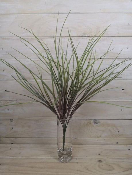 Lifelike artificial pink tall needle grass bush, perfect for vibrant home decor without maintenance.
