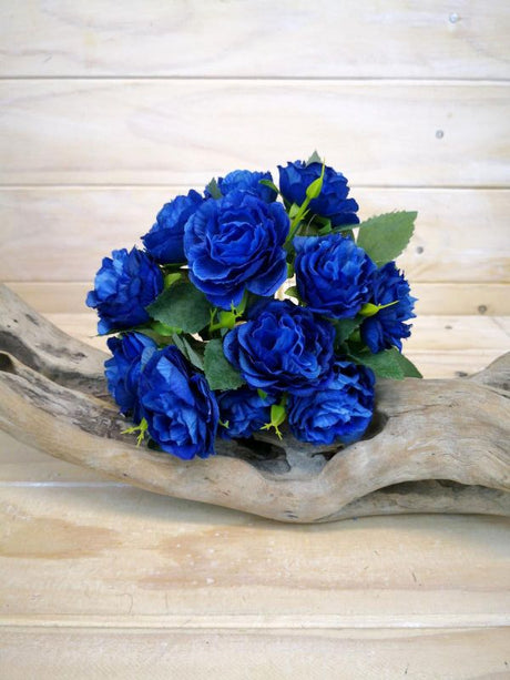 Artificial blue rose posy featuring lifelike roses for elegant home decor and low-maintenance beauty.