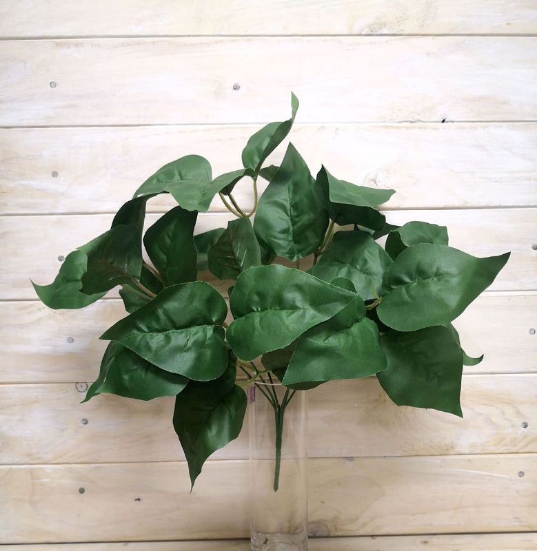 Lifelike large green artificial Philodendron leaf bush, perfect for elegant home and office decor without maintenance.