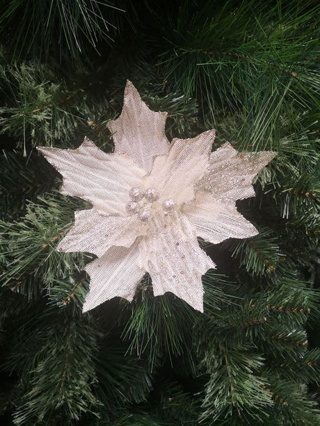 Lifelike beige artificial poinsettia head, perfect for elegant home decor and versatile arrangements all year round.