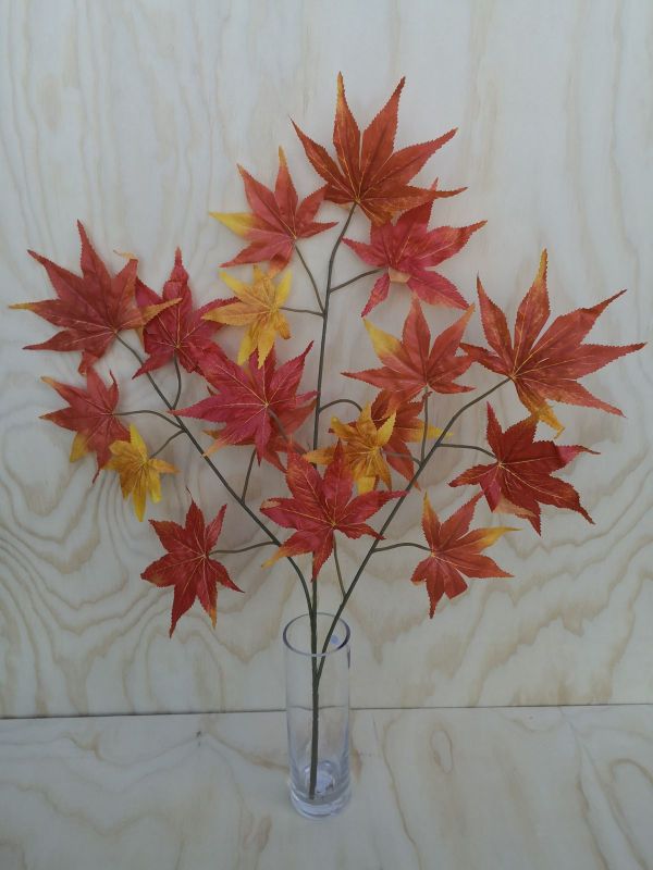 Vibrant orange artificial maple leaf spray, ideal for autumn decor, floral arrangements, and lasting seasonal beauty.