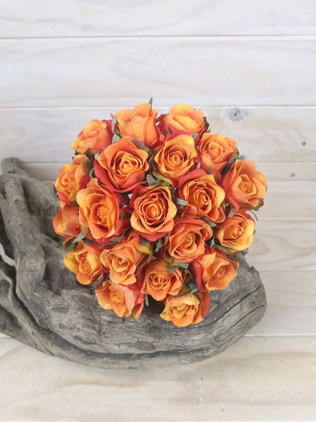 Vibrant orange artificial rose bud posy set of 20, perfect for elegant decor and maintenance-free floral accents.