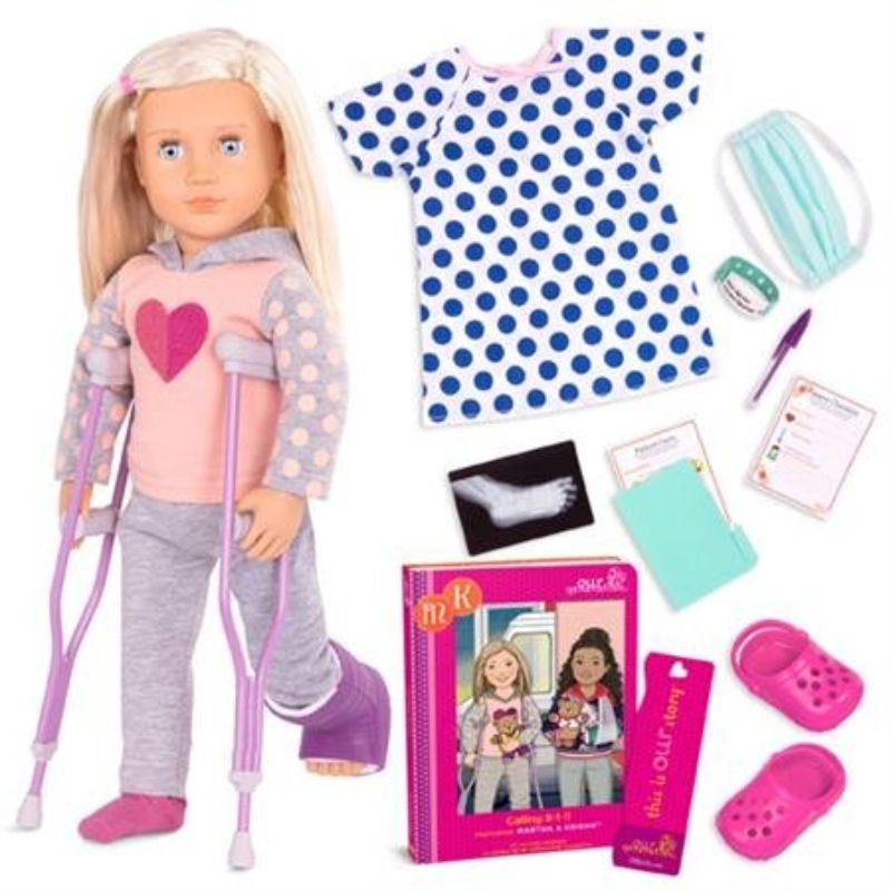 18-inch Our Generation Deluxe doll Martha with crutches, dressed in a hoodie, joggers, and medical accessories for imaginative play.