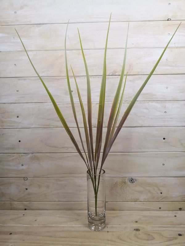Artificial Tall Grass Bush in vibrant pink, perfect for adding elegance and low-maintenance greenery to any space.