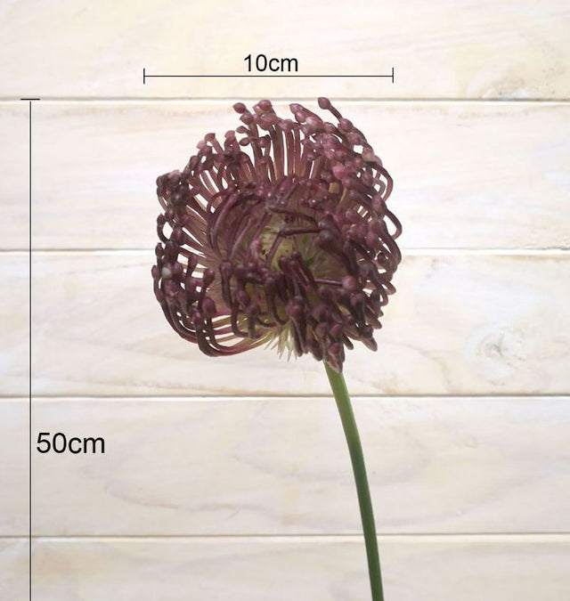 Lifelike purple artificial Warata stem, perfect for vibrant floral arrangements and versatile home decor.