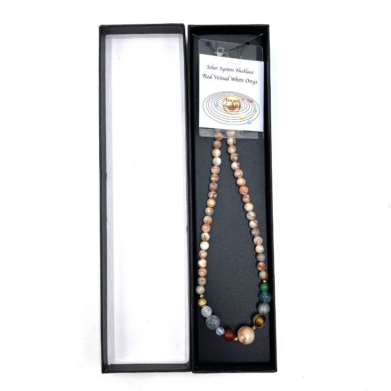 Elegant Solar System Necklace with Red Veined White Onyx beads, showcasing cosmic charm and sustainable fashion.