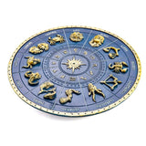 Deep blue zodiac incense burner with gold-painted symbols, perfect for creating a serene atmosphere.