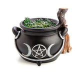 Cauldron-shaped LED light with green resin bubbles, broomstick design, and triple goddess pentacle for enchanting decor.