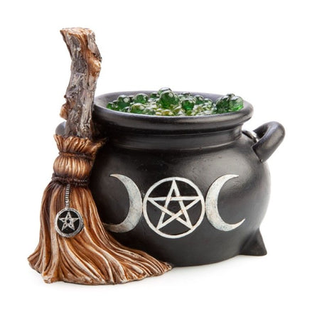 Enchanting 14.5cm LED Witches' Cauldron light in green resin, featuring broomstick design and shimmering bubble effects.