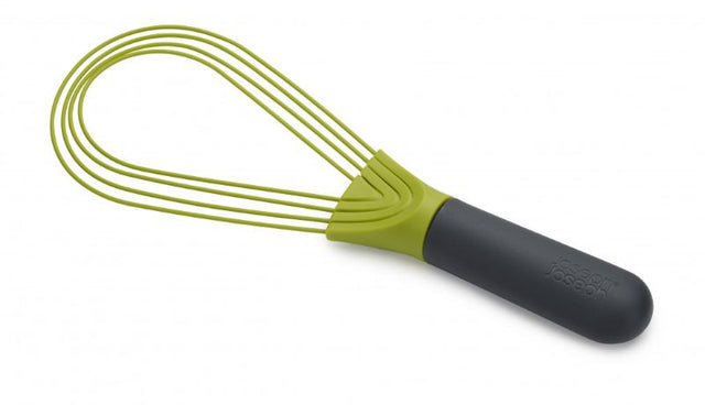 Joseph Joseph Twist Whisk in Grey/Green, a versatile kitchen tool that transforms from flat to balloon whisk for easy mixing.