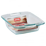 Set of 4 Pyrex Easy Grab® 20cm square baking dishes with ergonomic handles, durable glass, and ideal for versatile cooking.