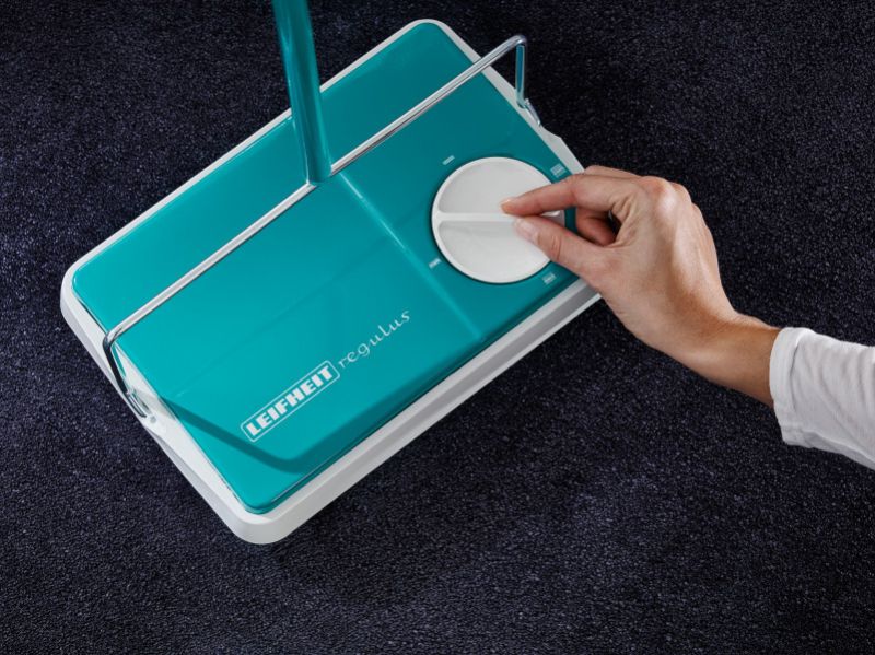 Leifheit Regulus Carpet Sweeper in metal, lightweight design, features three brushes for efficient cleaning of all carpet types.