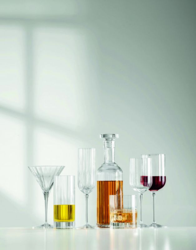 Elegant Luigi Bormioli Bach Liqueur set of 4, crafted from lead-free crystal with a faceted design for stylish serving.