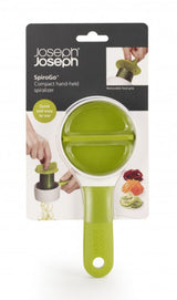 Green Joseph Joseph SpiroGo Compact Spiralizer for easy spiralizing of vegetables, featuring a long handle and sharp stainless-steel blade.