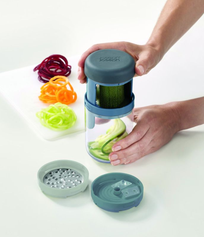 Joseph Joseph Spiro Spiralizer in Sky color, featuring a compact design for effortless spiralizing of fruits and vegetables.