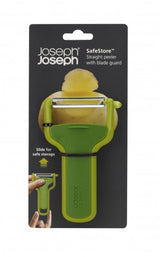 Joseph Joseph SafeStore Green Peeler with a stainless-steel blade, integrated guard, and potato-eye remover for safe, easy peeling.