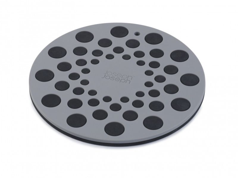 Joseph Joseph Spot-On grey silicone trivets with raised dot design for heat protection and modern kitchen style.