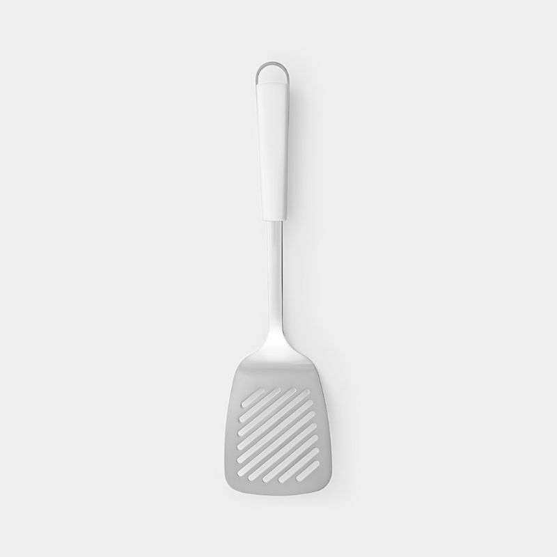 Large stainless steel spatula (33.3cm) with ergonomic grip, ideal for flipping and serving food, dishwasher safe for easy cleaning.