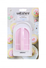 Pink dual fondant smoother with two sizes for achieving flawless cake finishes and ergonomic grip.