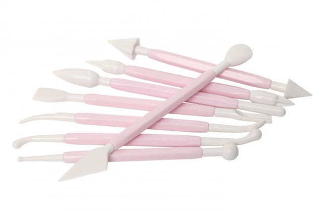 Set of eight durable fondant tools for creating lifelike cake decorations, dishwasher safe and compact for easy storage.