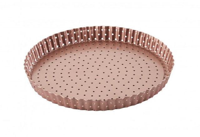 Wiltshire Perforated Round Quiche pan in rose gold, perfect for baking tarts and quiches with even heat distribution.