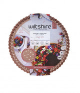 Wiltshire Perforated Round Quiche pan in rose gold, designed for even baking and easy food release, 23.5cm diameter.