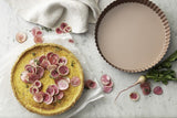 Rose gold quiche and tart pan, 24cm, non-stick, removable base, embossed measurements, oven safe, stylish and functional bakeware.