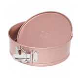 Rose gold 19cm springform pan with non-stick coating, ideal for baking cheesecakes and layered cakes effortlessly.