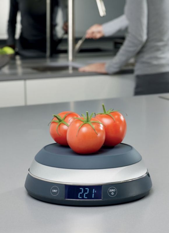 Joseph Joseph Switch Scale in Grey, a versatile digital kitchen scale with a flip lid for measuring and a bright LCD display.