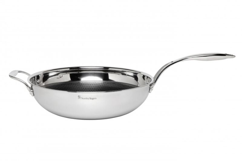 Stanley Rogers Matrix 32cm stainless steel wok pan, featuring triple-ply construction, textured surface, and cool-touch handle.