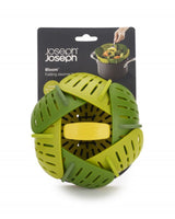 Joseph Joseph Bloom Folding Steamer Basket, a versatile, compact kitchen tool with self-adjusting sides for various pan sizes.