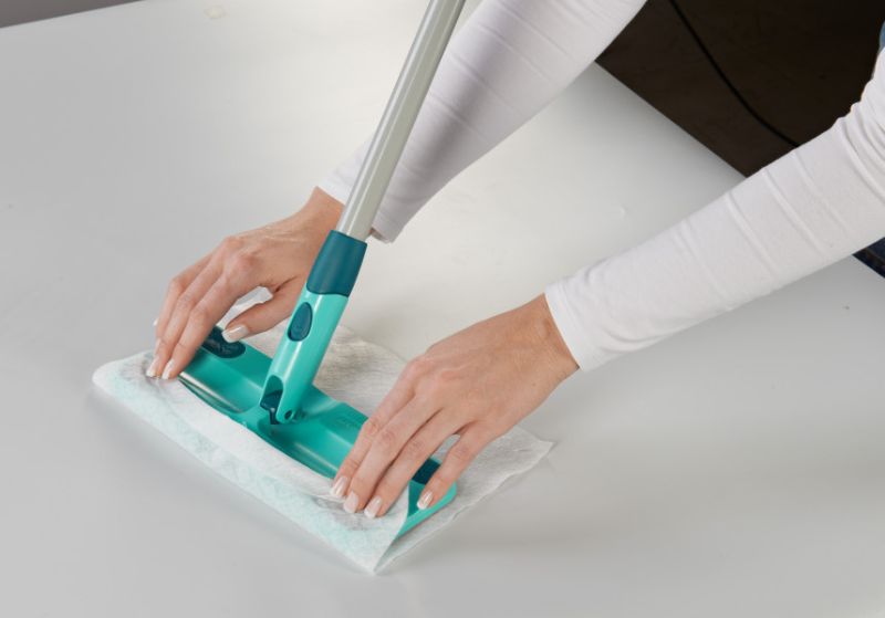 Leifheit Click System Clean & Away Floor Duster with 5 static dust cloths for effortless cleaning around furniture.