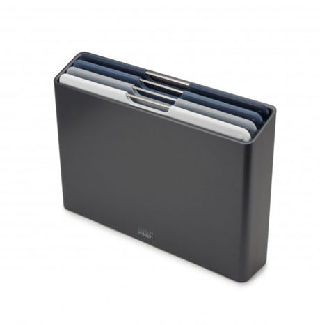 Sleek graphite 4-piece chopping board set with color-coded boards, textured surfaces, and non-slip feet in a stylish storage case.