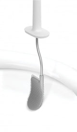 Flexible D-shaped toilet brush in grey/white with anti-drip and anti-clog features for hygienic bathroom cleaning.